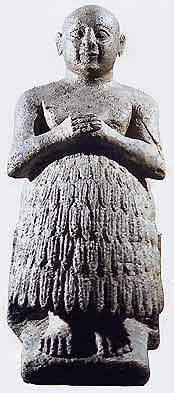 Statua dello scriba Dudu, pietra grigia, 2500 a.C. circa (Baghdad, Iraq museum)